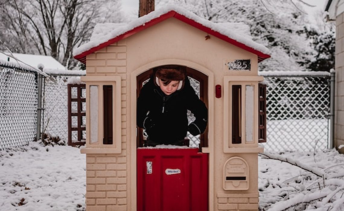 Playhouse with child in it.