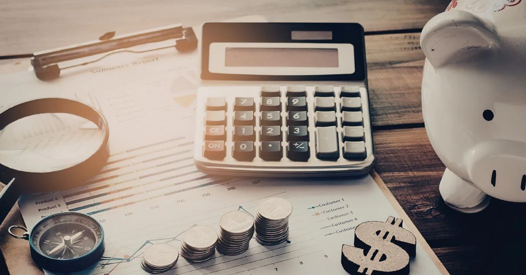 Photo of paperwork and calculator