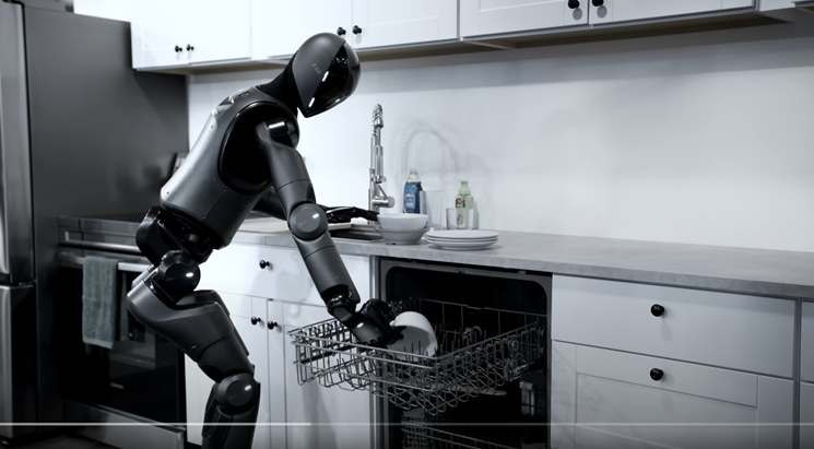 Humanoid robot in action doing dishes
