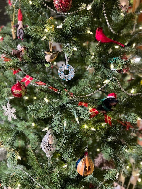 Christmas ornament on tree - Evans Family Wealth holiday gift