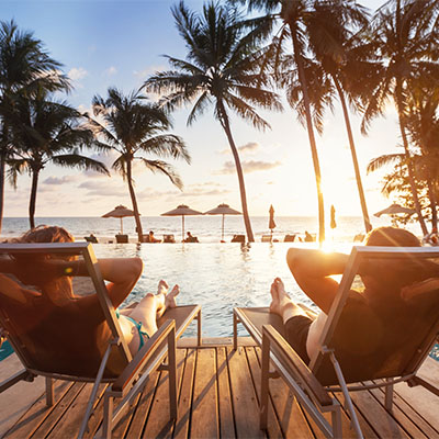 Luxury travel - couple in beach hotel