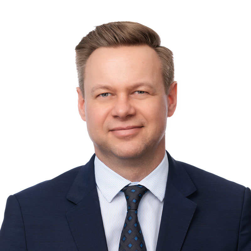 A headshot of Darren Morcom