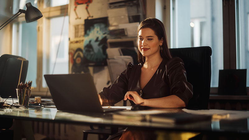 Business woman working at her desk