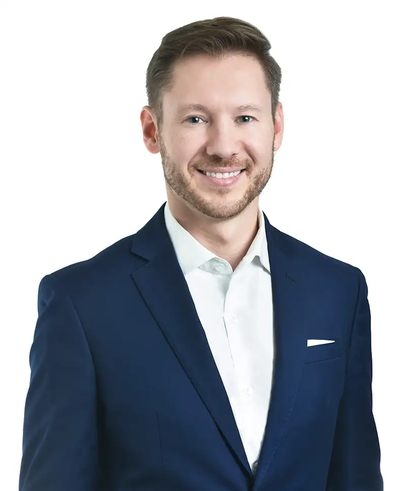 A headshot of Tyler Michalowski